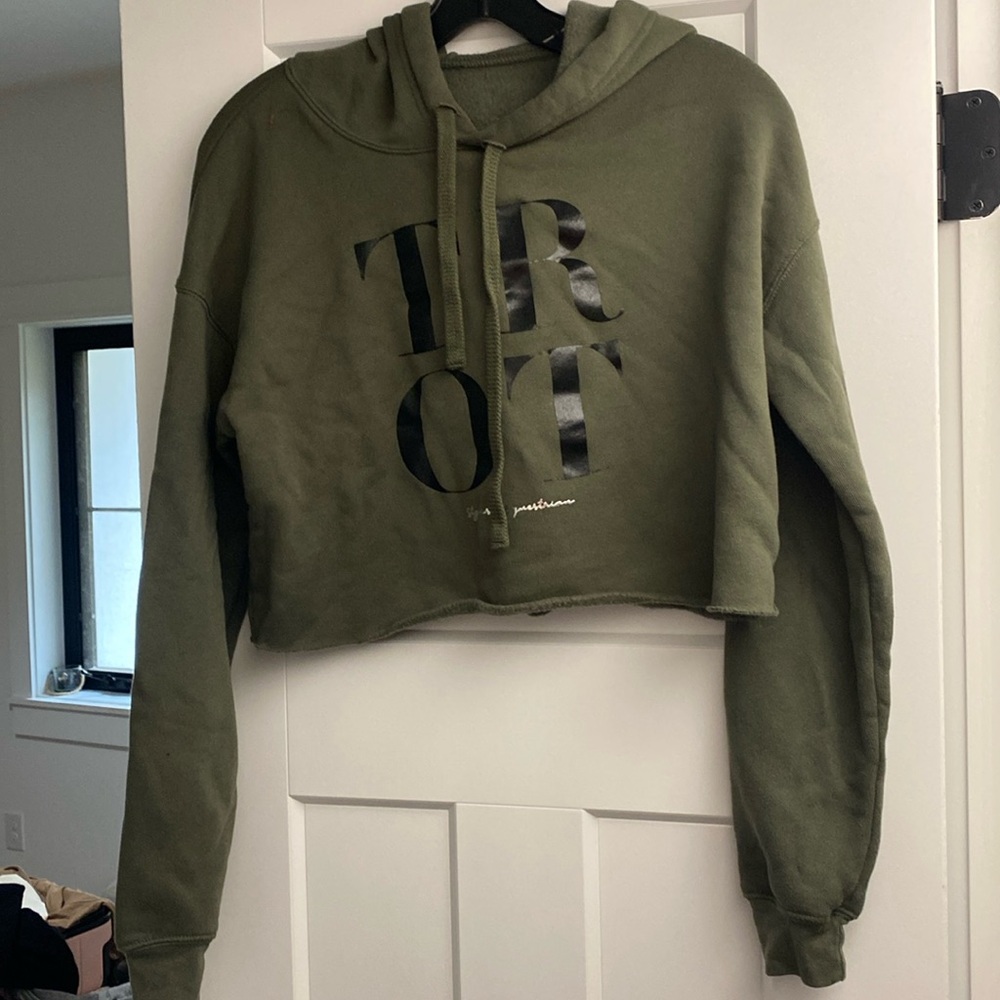 Brand new cropped sweatshirt.  No size but will fit a small to a medium